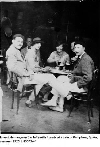 Ernest Hemingway (far left) with friends at a cafe in Pamplona, Spain, summer 1925. EH05734P