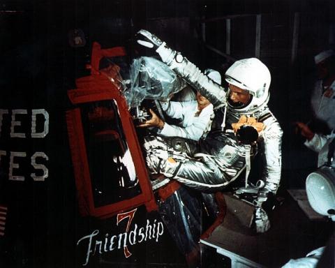 John Glenn being inserted into the Friendship 7 spacecraft on the day of his launch, February 20, 1962